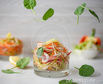 Finely chopped vegetable salad in a glass bowl Stock Photo