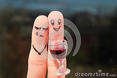 Finger art of couple. Woman is upset, man drunk. Stock Photo