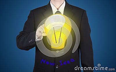 finger of businessman press to bulb with new idea reflect paint Stock Photo