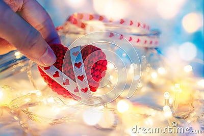Finger catch heart shape and light decorative bokeh. Love, Valentine and holiday concept Stock Photo