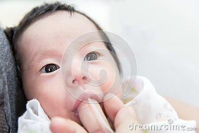 Finger Feeding baby Stock Photo
