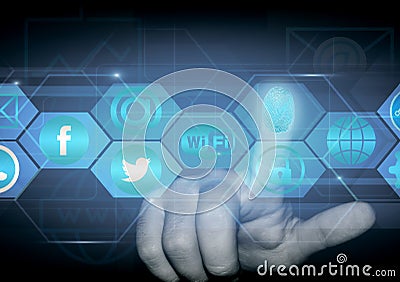 Finger of a person clicks on a hologram with signs of social networks Stock Photo