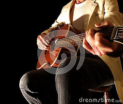 Finger Picking on the Acoustic Guitar Stock Photo