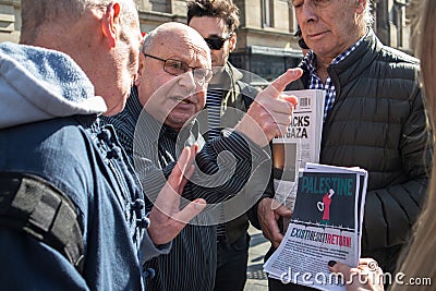 Finger pointing and angry debate at the Free Palestine Rally held by the Palestine Solidarity Campaign organised to coincide with Editorial Stock Photo