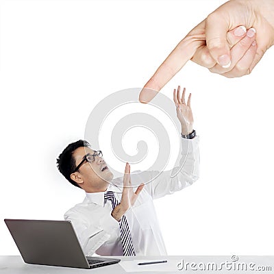 Finger pointing a businessman Stock Photo