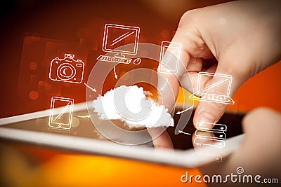 Finger pointing on tablet pc, mobile cloud concept Stock Photo