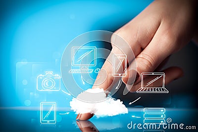 Finger pointing on tablet pc, mobile cloud concept Stock Photo