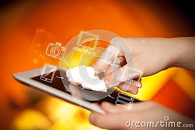 Finger pointing on tablet pc, mobile cloud concept Stock Photo