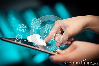 Finger pointing on tablet pc, mobile cloud concept Stock Photo