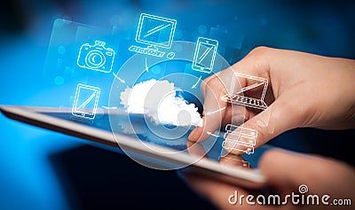 Finger pointing on tablet pc, mobile cloud concept Stock Photo