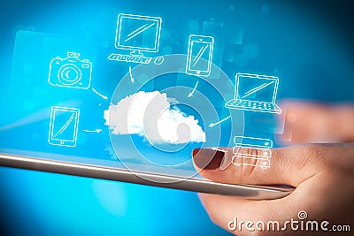 Finger pointing on tablet pc, mobile cloud concept Stock Photo