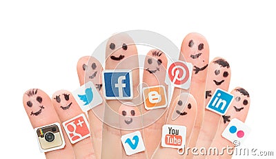 Finger with popular social media logos printed on paper. Editorial Stock Photo