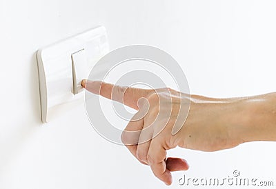 Finger press on light button Stock Photo