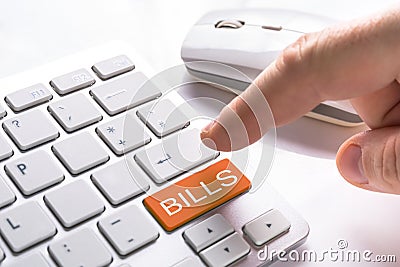 computer button with bills sign Stock Photo
