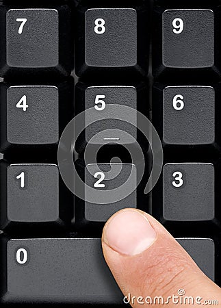 Finger Pressing Computer Keyboard Numeric Keys Stock Photo