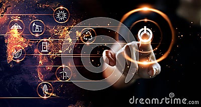 Finger pressing power button with energy resources icon on earth Stock Photo