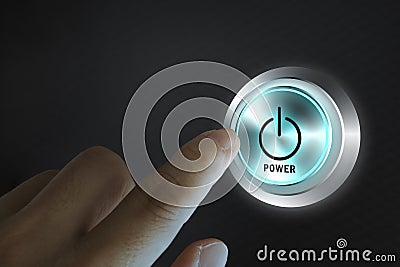 Finger about to press a power button. Hardware equipment concept Stock Photo