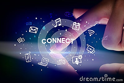 Finger touching tablet with social media icons concept Stock Photo