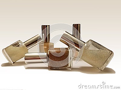 Fingernail polish bottles placed on a white background showing shadows Stock Photo