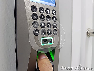 Fingerprint and access control in a office building Stock Photo