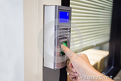 Fingerprint machine in a office building Stock Photo