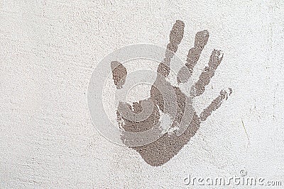 Handprint on the plastered wall. Stop concept Stock Photo