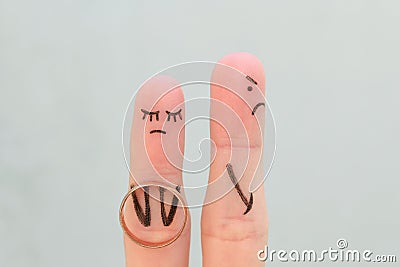 Fingers art of couple. Concept woman made an offer to get married, man refused Stock Photo