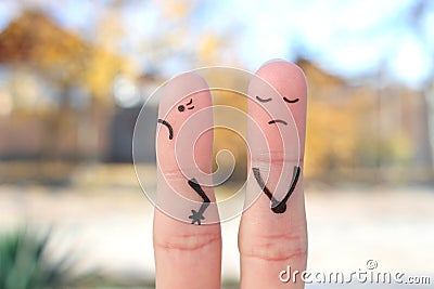 Fingers art of displeased couple. Woman was offended, man was guilty Stock Photo