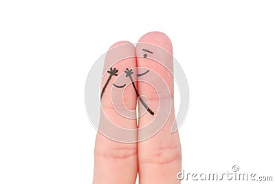 Fingers art of Happy couple. Boy closed her eyes to girl. Concept of girl guessed Stock Photo