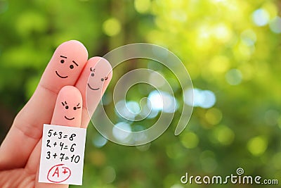 Fingers art of happy family. Concept of child got good grade Stock Photo