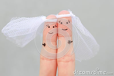 Fingers art of happy gay couple to get married. Concept of wedding ceremony Stock Photo