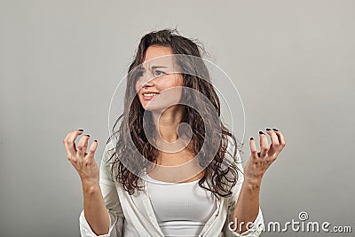 Fingers claw gesture, looks angry hand, shouting, squeez hands in fists Stock Photo