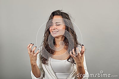 Fingers claw gesture, looks angry hand, shouting, squeez hands in fists Stock Photo