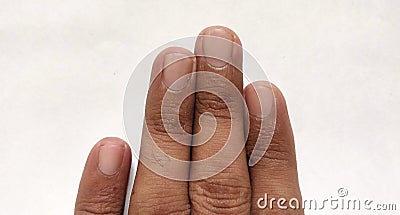 Fingers of human body. Cutting nails. Index finger. Ring finger. Pinky finger. Stock Photo