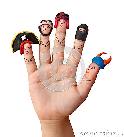 Fingers men with in men`s hats out of clay. Stock Photo