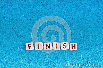 Finish word on stone Stock Photo