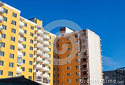 Almost finished facade work and insulation of new multistory building Stock Photo