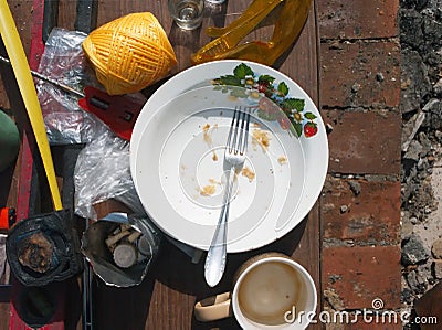 Finished lunch on makeshift table Stock Photo