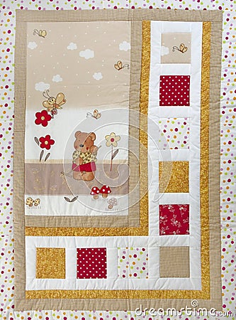 Finished quilt with tiny bear Stock Photo