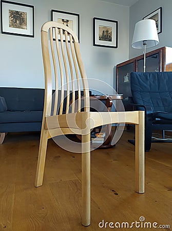 Repairing of old chair with lime and wood clamps Editorial Stock Photo