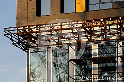 Finishing the facade of the building with a ventilated facade. A fragment of a residential building, hotel, hospital or other Stock Photo
