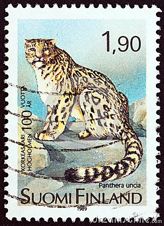 FINLAND - CIRCA 1989: A stamp printed in Finland shows Snow Leopard Panthera uncia, circa 1989. Editorial Stock Photo