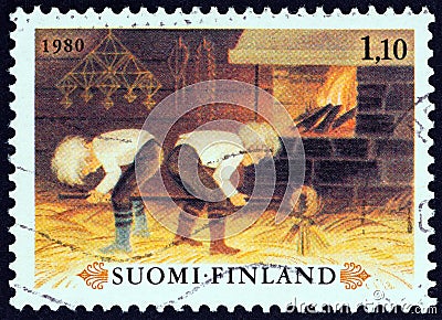 FINLAND - CIRCA 1980: A stamp printed in Finland shows To put out the shoe maker`s eye children`s game, circa 1980. Editorial Stock Photo