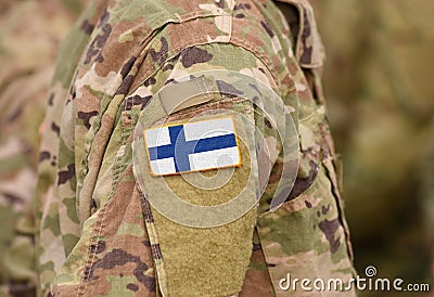 Finland flag on soldiers arm collage Stock Photo