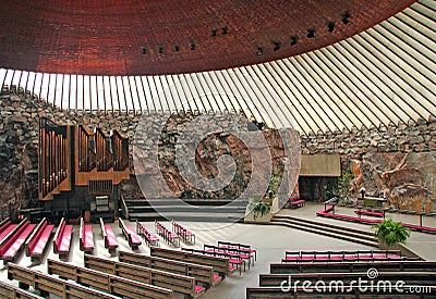 Finland - Helsinki - Austere interior of Temppeliaukion kirkko or church in the rock, beautiful temple built inside the rock Editorial Stock Photo