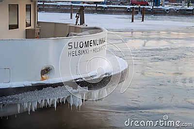 FINLAND, HELSINKI - JANUARY 2015: Local ferry to Suomenlinna in winter parked in ice Editorial Stock Photo
