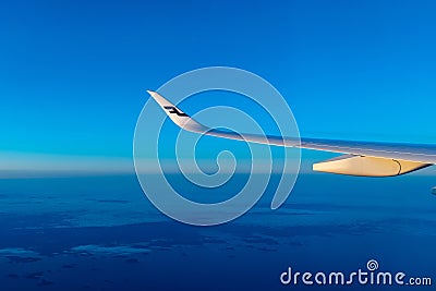 Finland Helsinki 2 MAR 2020 Finnair logo on airplane wing Editorial Stock Photo