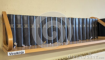 Shelf with identical Hymn books, Kotka-Kymin Parish Church, Finland Stock Photo