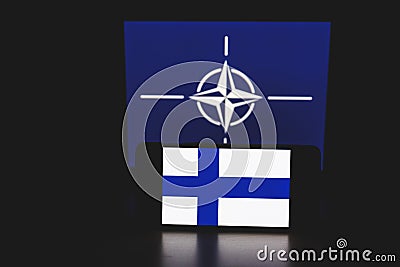 Finland and NATO flag in background. NATO flag in background Editorial Stock Photo