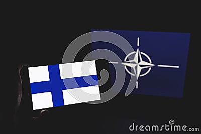 Finland and NATO flag in background. NATO flag in background Editorial Stock Photo